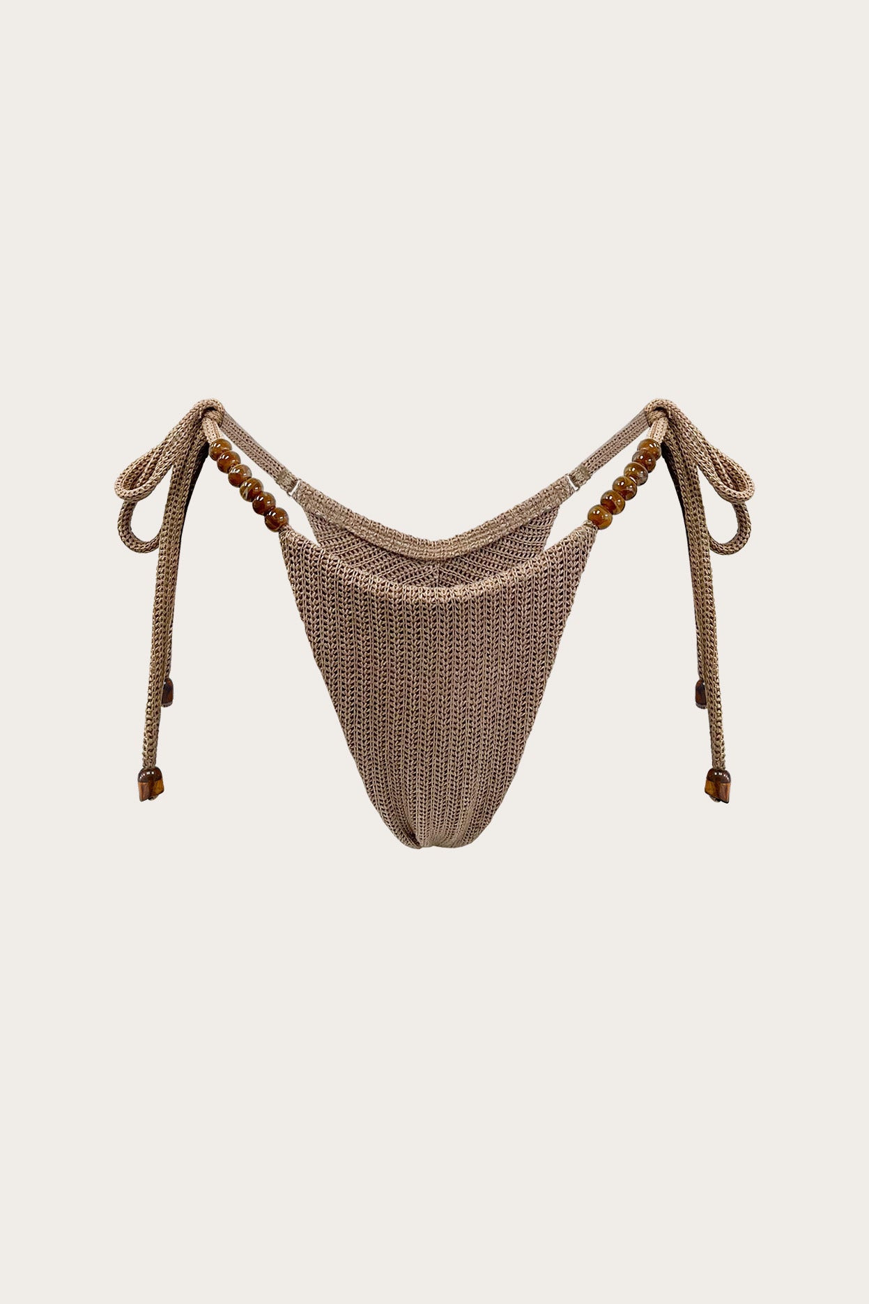 Toasted sand knit tie-side thong bikini bottom with wood bead detailing