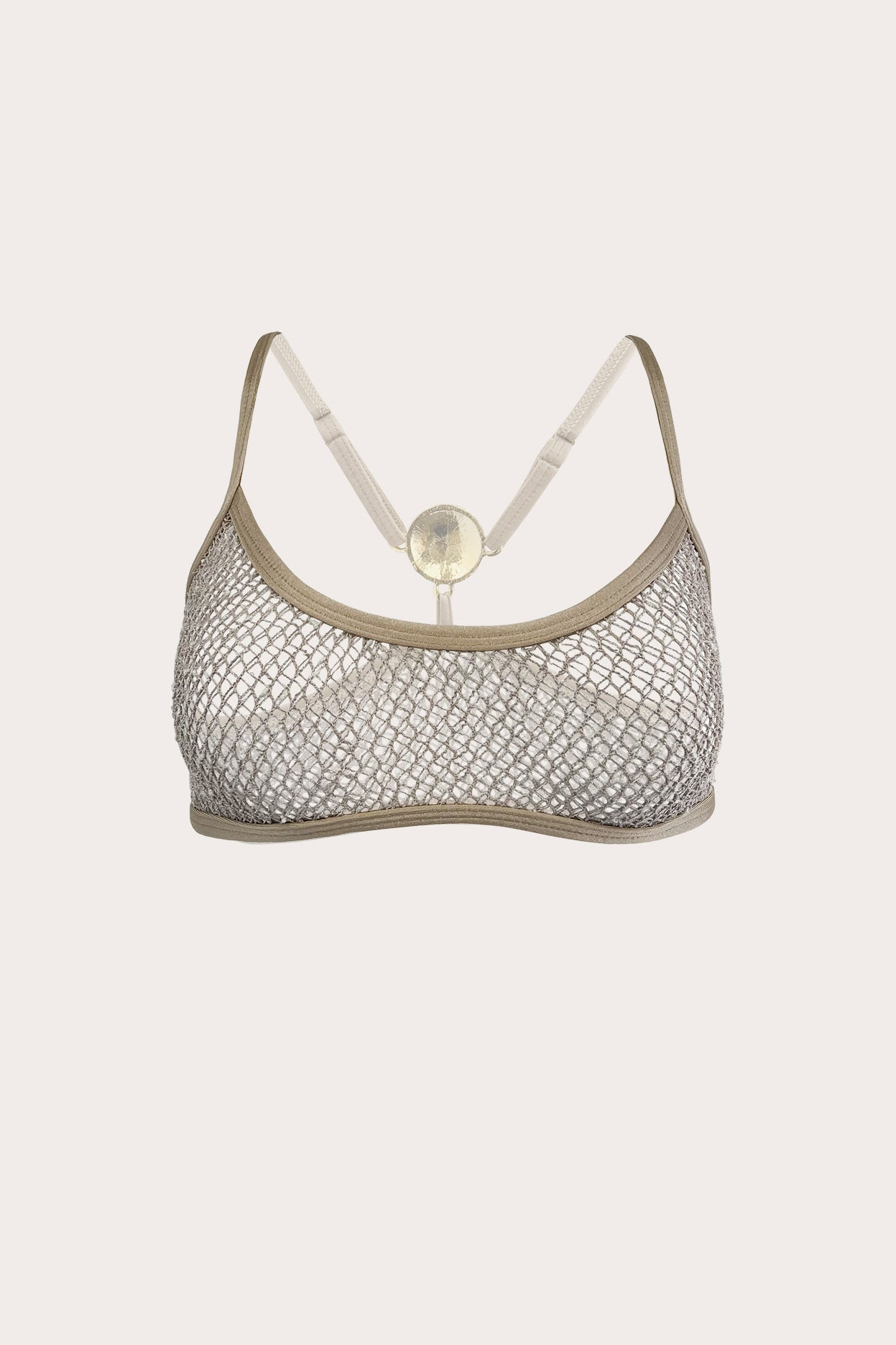Sheer netted layering top in Dune with gold medallion back detail and adjustable straps on a light background