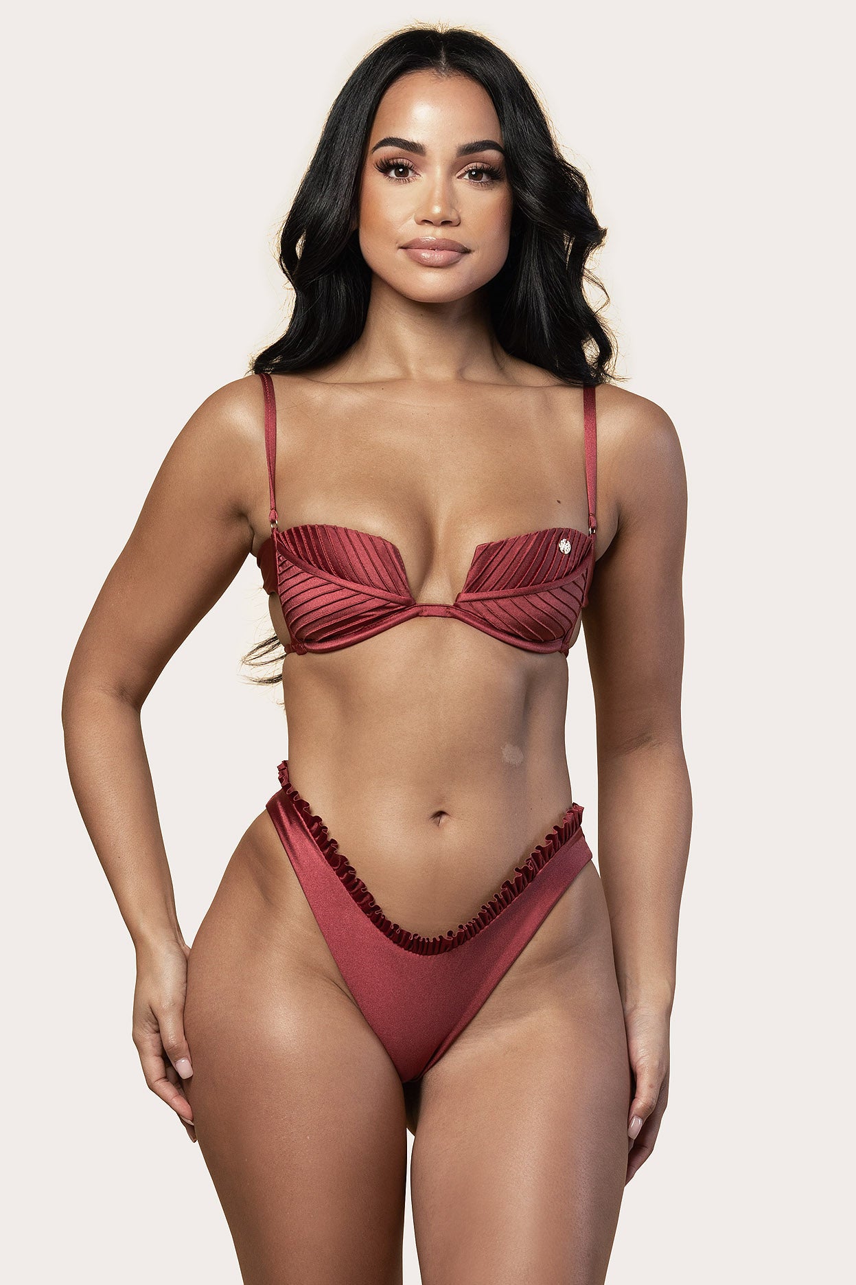 woman wearing Sangria red Palma bikini top with sculpted pleated texture front view