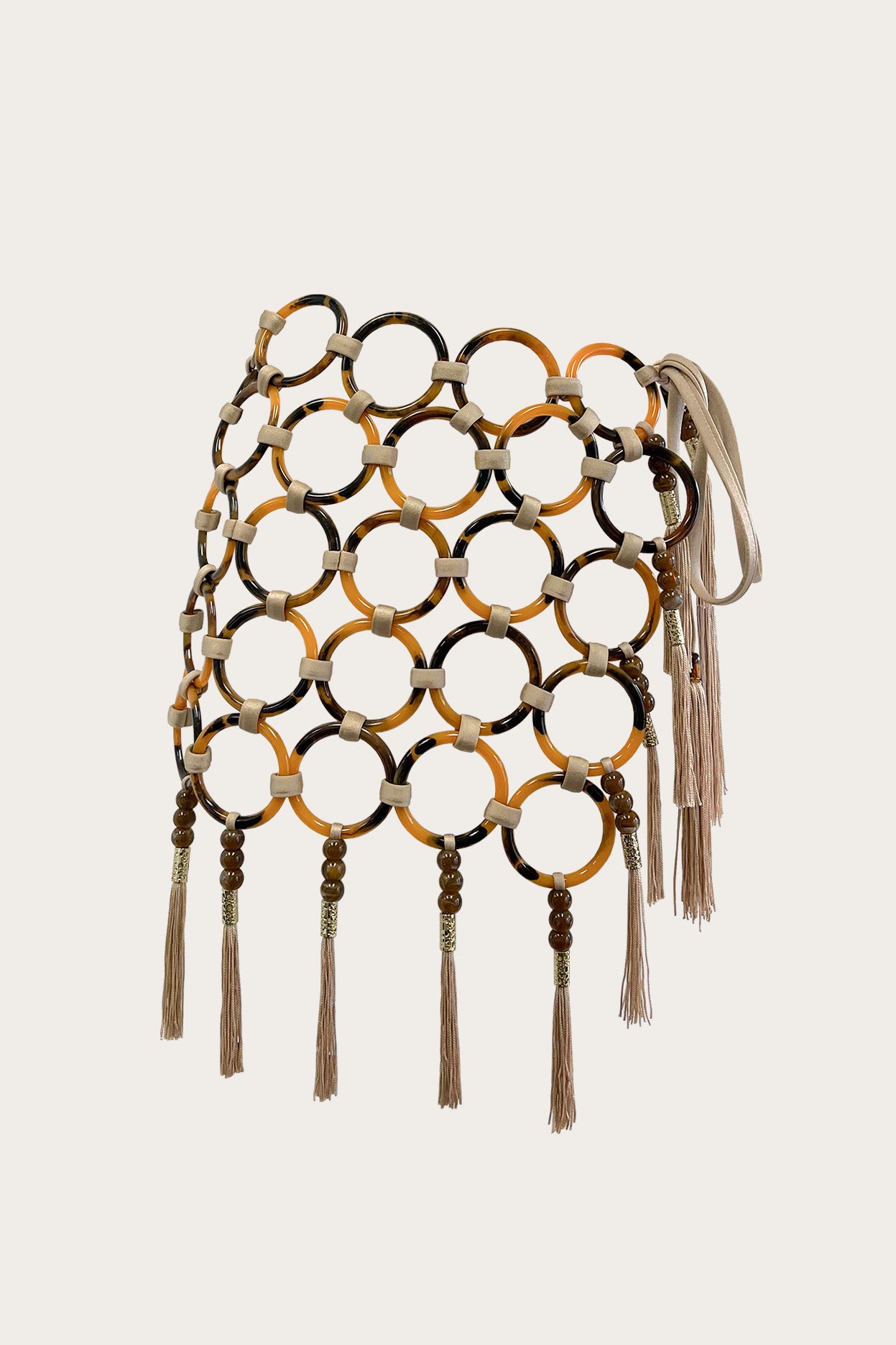 Handcrafted resin ring mini skirt with tassel fringe detailing and side tie closure