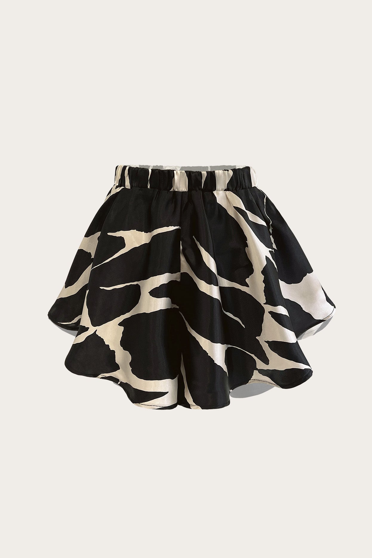 Flowy chiffon resort shorts in black and cream Desert Ink print